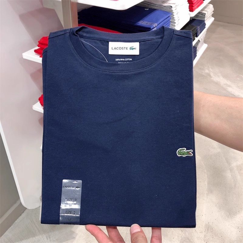 LACOSTE ลาคอสท์/จระเข้ฝรั่งเศสผู้ชายโลโก้ขนาดเล็กที่เรียบง่ายสบายๆคอกลมแขนสั้นเสื้อยืดผ้าฝ้ายแท้