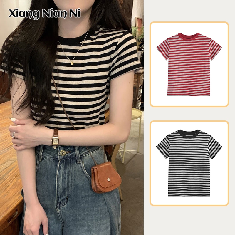 Xiang Nian Ni เสื้อยืดแขนสั้น ลายทาง สไตล์เรโทร อเมริกัน สําหรับผู้หญิง