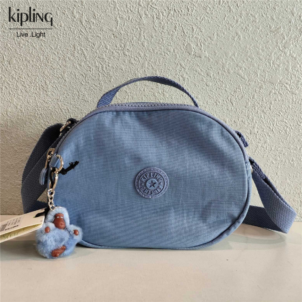 KIPLING คิปลิง แฟชั่นกระเป๋าสตรีหลายชั้นอเนกประสงค์ ค โรสบอดี กระเป๋าน้ําหนักเบากระเป๋าสะพาย วงรี กร