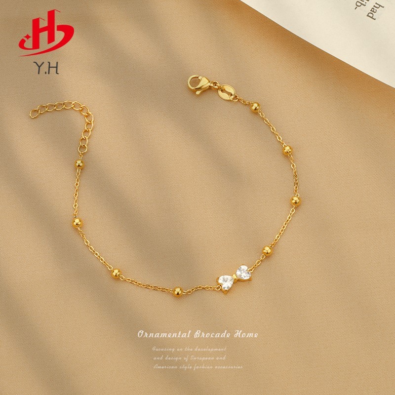 Y.H ผีเสื้อเพชร สีทอง 18 K สร้อยข้อมือสแตนเลส