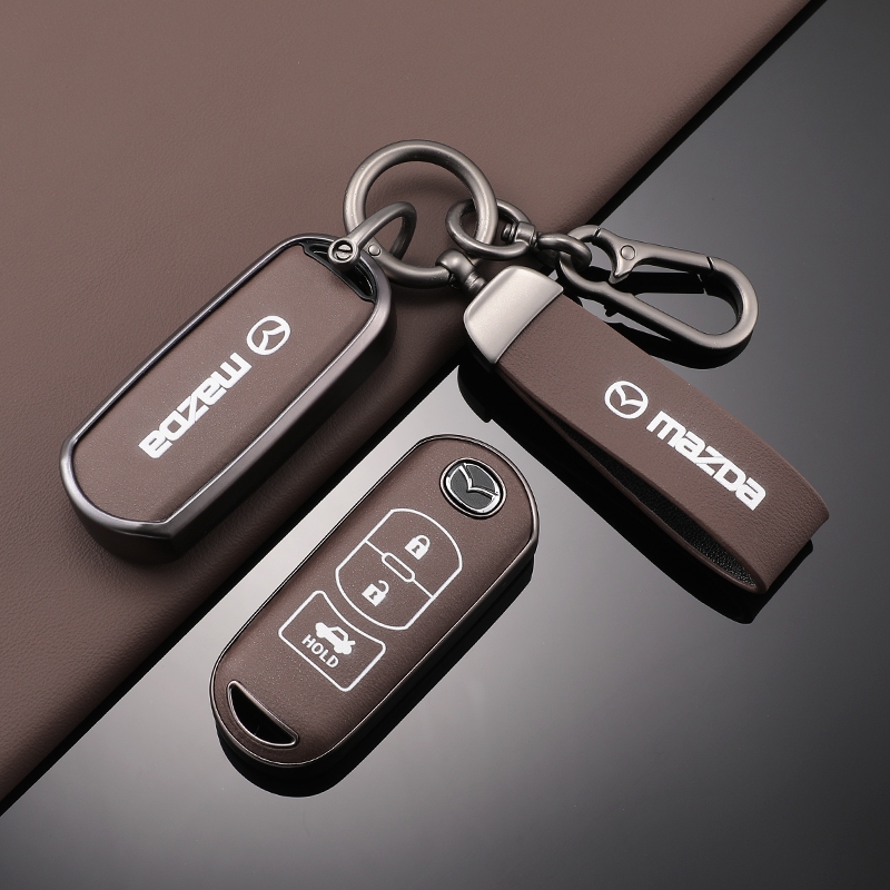 Mazda เคสกุญแจรีโมทรถยนต์ เครื่องหนัง+tpu สําหรับ Mazda 2 Mazda 3 Mazda 6 CX3 CX4 CX5 7 CX9 CX30 ของ