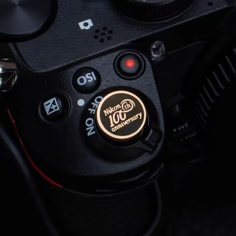 ฝาครอบป้องกันรองเท้าร้อนทําจากทองแดงบริสุทธิ์ Nikon ZFz30z50zfcz5z62 ปุ่มชัตเตอร์ที่ระลึกร้อยปีอุปกรณ์เสริมกล้องกล้องรุ่น Canon
