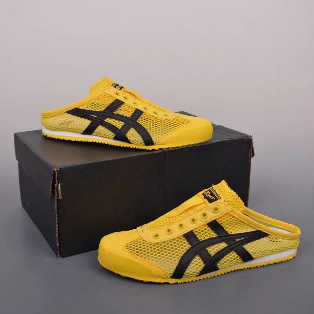 Onitsuka Tiger ฤดูร้อนครึ่งสนับสนุนตาข่ายระบายอากาศ One-Pedal ผู้ชายผู้หญิงสไตล์เดียวกันรองเท้าขี้เกียจรองเท้าชายหาดรองเท้าแตะรองเท้าลําลอง Bruce Lee Y