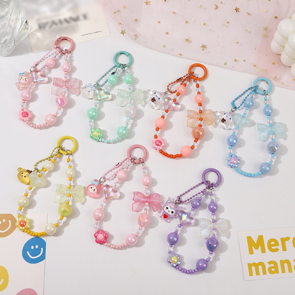 พร้อมส่ง+COD [แฟชั่น] หวานสีสันโบว์ลูกปัดพวงกุญแจจี้กระเป๋าโทรศัพท์หูฟังกรณีอุปกรณ์ตกแต่งแฟชั่นกุทัณฑ์ลูกปัดพวงกุญแจของขวัญ