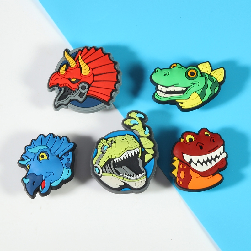 Crocs Carlo Chi รองเท้าอุปกรณ์เสริมตกแต่งหัวเข็มขัดการ์ตูน Zhibixing Jurassic Park ไดโนเสาร์ Series รองเท้าดอกไม้