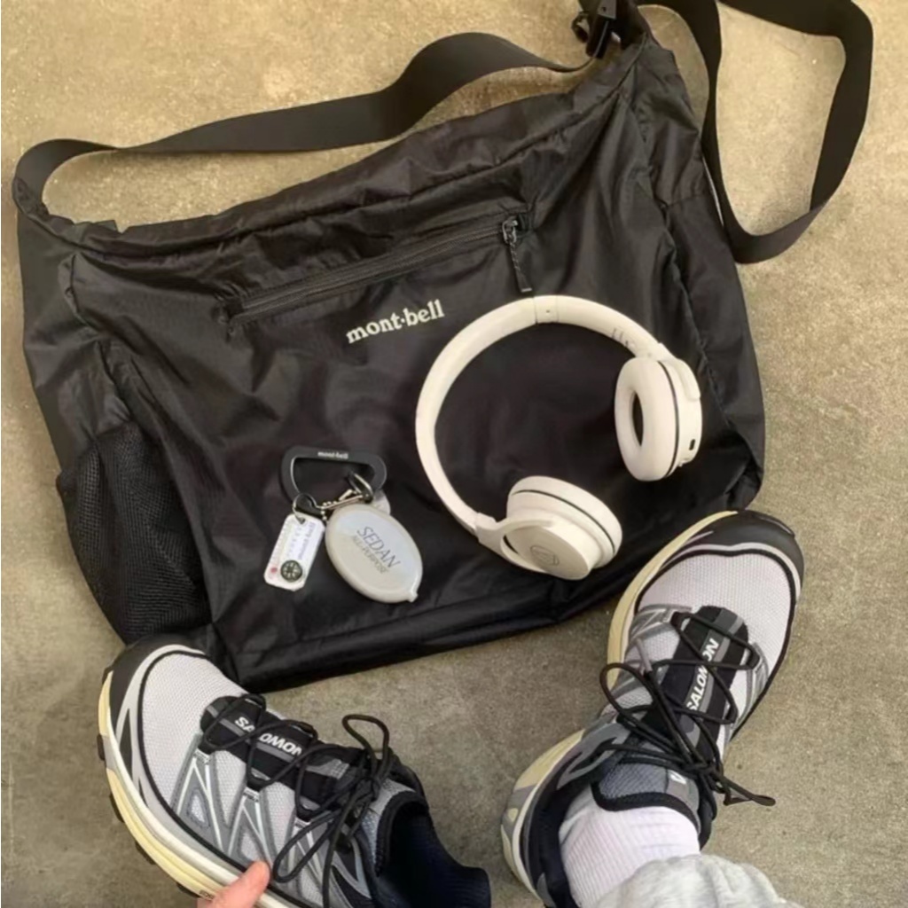 Montbell Pocketable Light กระเป๋าสะพายปฏิบัติ Ultra-Lightweight Messenger กระเป๋าพับเก็บกลางแจ้งกันน้ํา 70D ไนลอน Tear-Resistant ผ้ายูรีเทนเคลือบ All-Match ไหล่เดียวผู้ชายผู้หญิงคู่