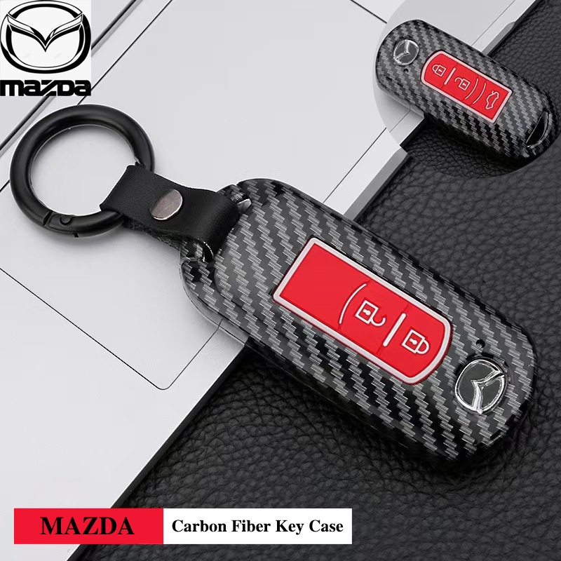 2/3 ปุ่มคาร์บอนไฟเบอร์ระยะไกลสมาร์ทรถ Key Chain แหวนฝาครอบคาร์บอนสําหรับ Mazda ฝาครอบกุญแจรถสําหรับ Mazda 2/3/CX-3/CX-5/Skyactiv