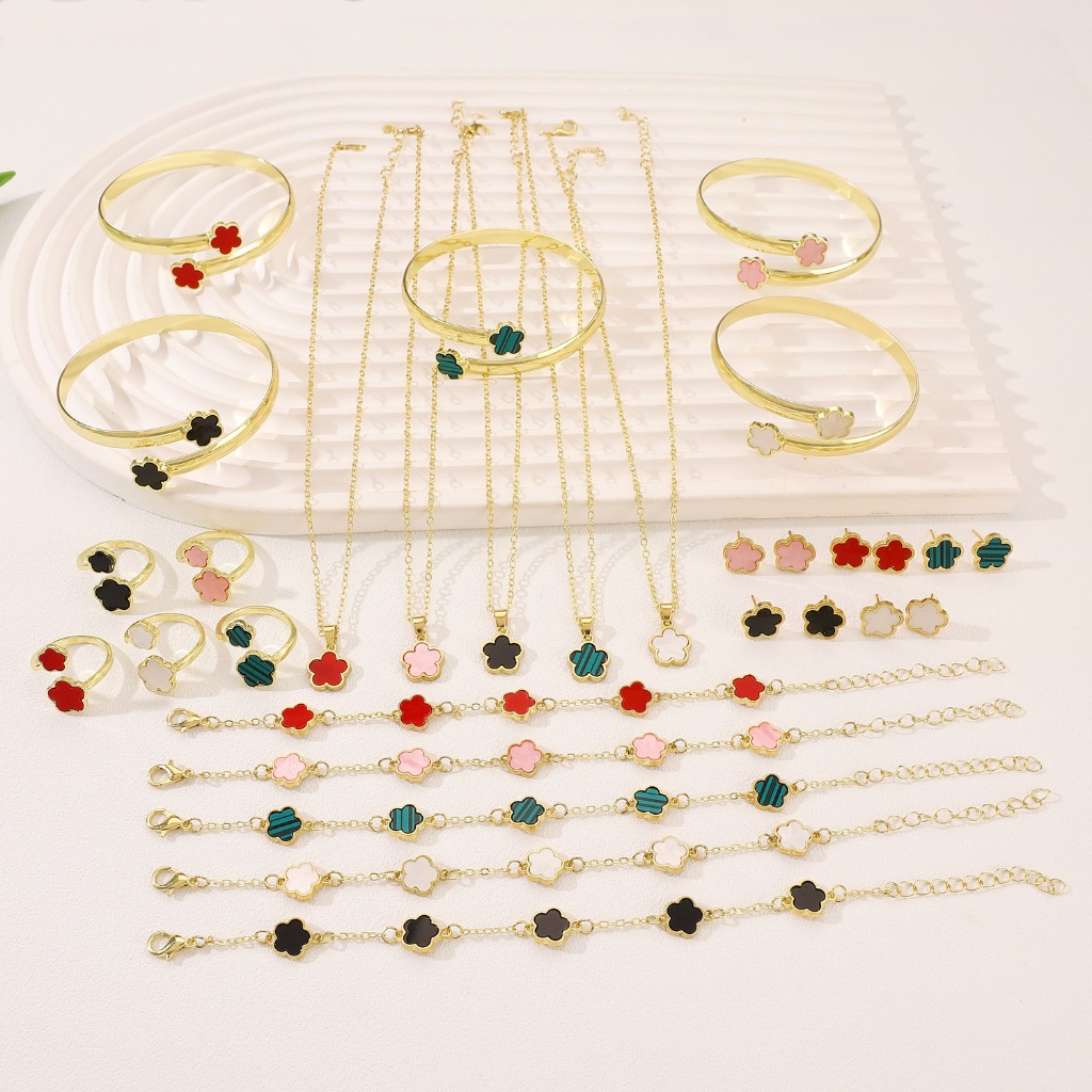 Jushi 6 ชิ้น Lucky ดอกไม้สร้อยข้อมือ Cinquefoil สร้อยคอแหวนต่างหูชุด Hypoallergenic 18K Colourfast ของขวัญสําหรับผู้หญิง