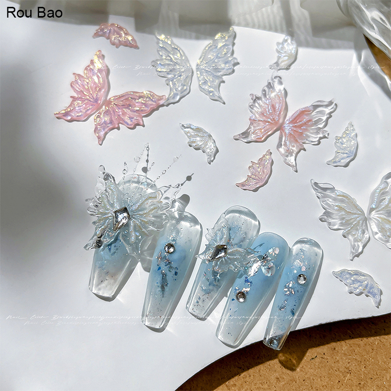 Rou Bao 50 ชิ้นเล็บครึ่งปีกผีเสื้อโปร่งใส Aurora Wing Girly เรซิ่นเล็บ Art DIY Charms ตกแต่ง
