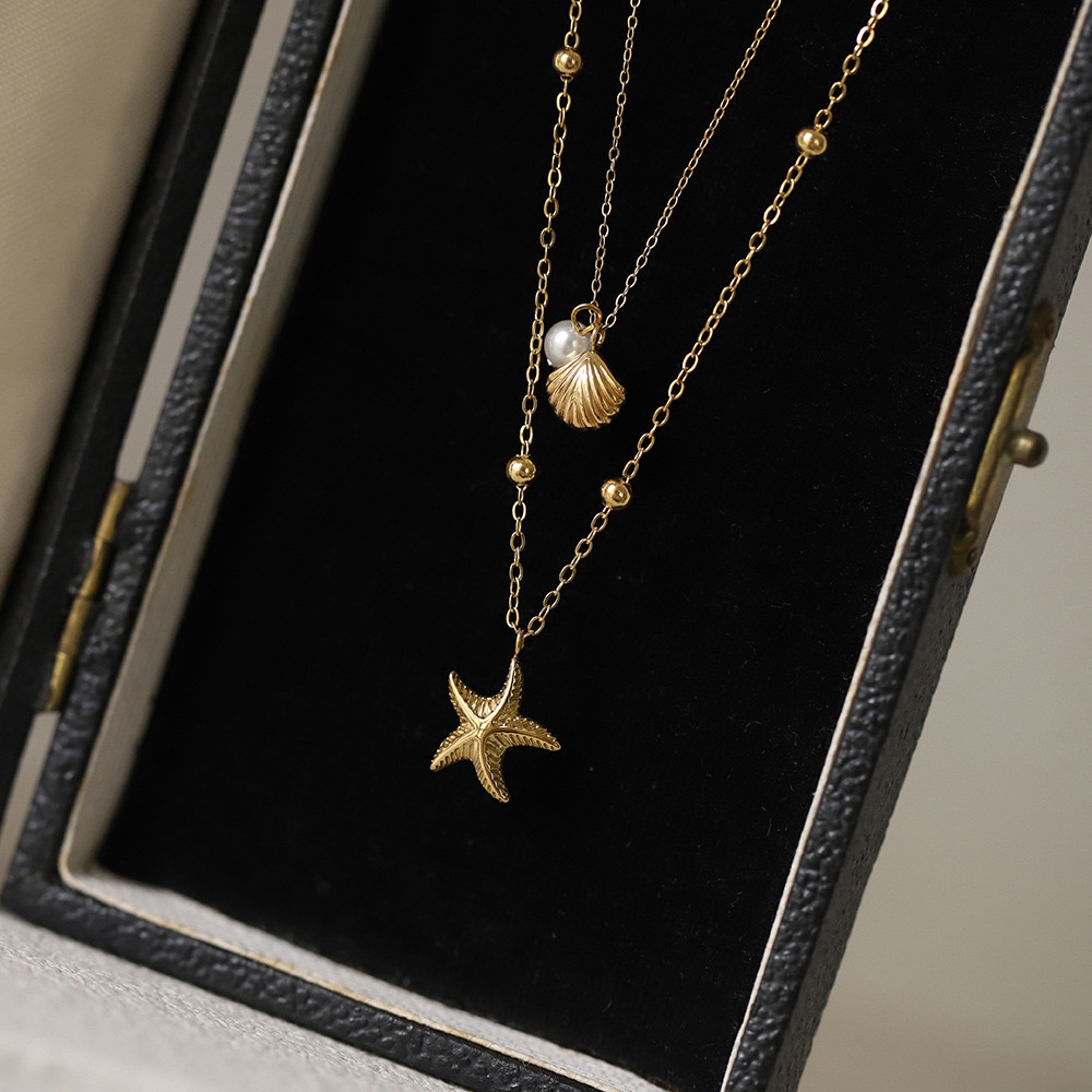 Ocean Vacation Series ปลาดาว Shell Pearl Double Layer 18K Gold สร้อยคอเหล็กไทเทเนียมสีการเก็บรักษาสร้อยคอ