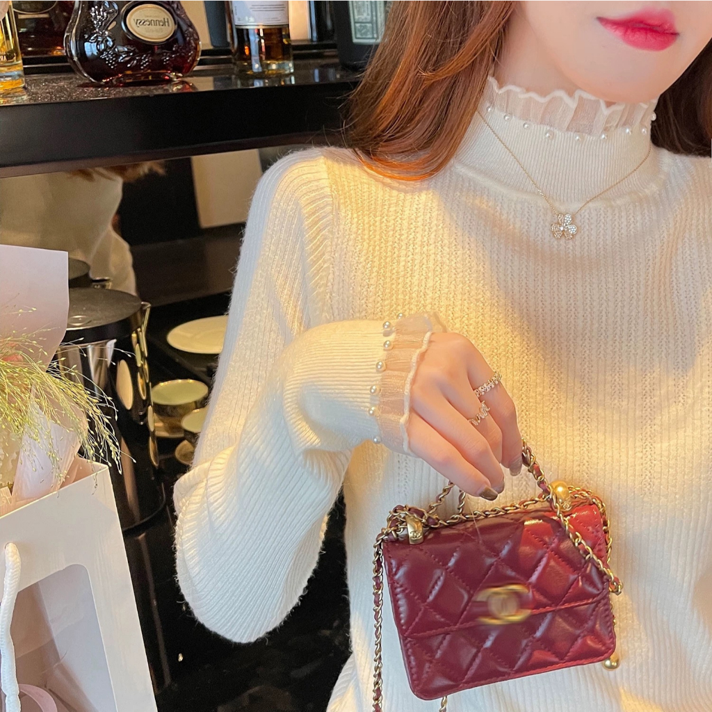 ครึ่งคอเต่าแขนยาวด้านใน จุดต่ําสุด เสื้อผู้หญิงฤดูใบไม้ร่วงฤดูหนาวสไตล์ใหม่เสื้อกันหนาวมุกลูกไม้ถักด้านบน