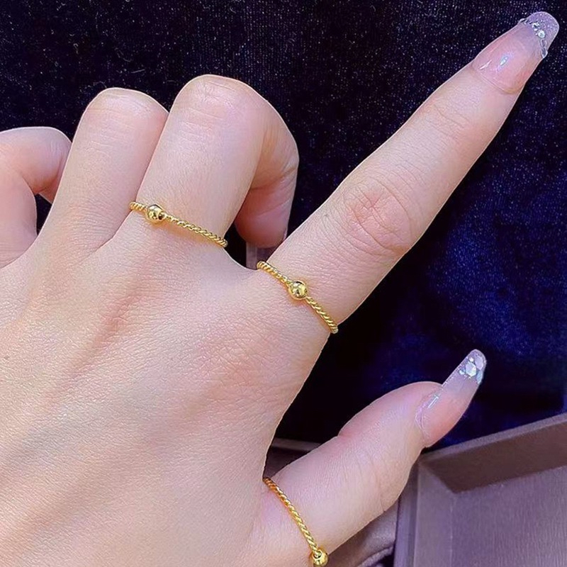 เวอร์ชั่นเกาหลี Fine Twist Small Ball 18K Gold แหวนเหล็กไทเทเนียมสีการเก็บรักษารุ่นแหวนสาว