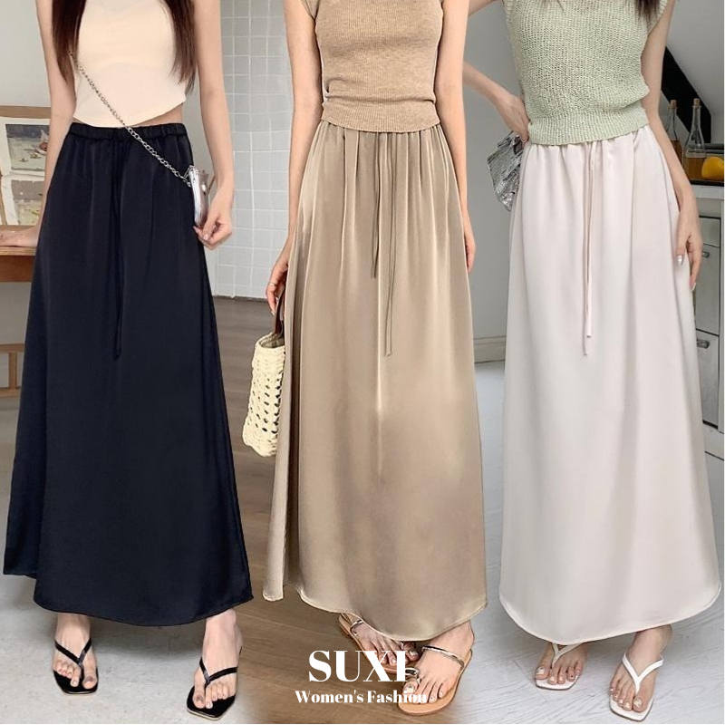 Suxi กระโปรงผ้าซาตินผ้าไหมน้ําแข็งเชือกรูดเรียบง่ายสําหรับฤดูร้อนของผู้หญิงเอวสูงความยาวปานกลางกระโปรงทรงเอ