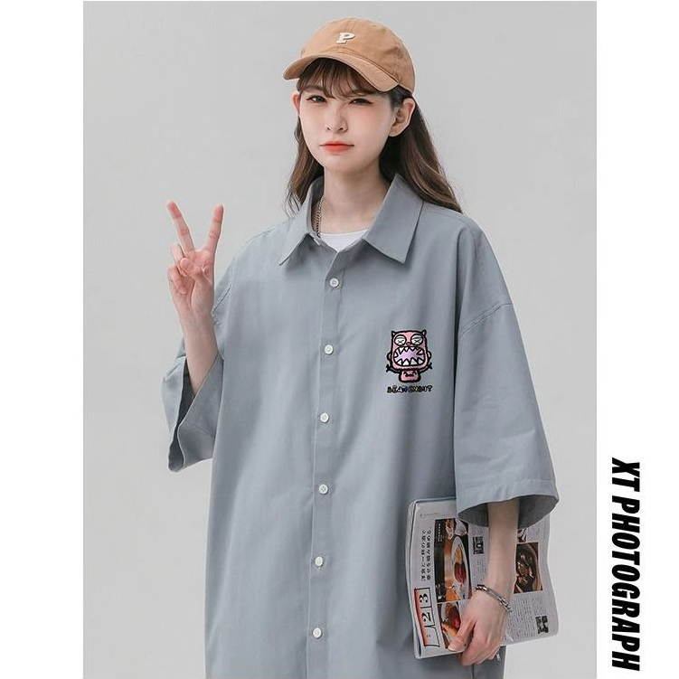 พลัสขนาดแขนสั้นผู้หญิงออกแบบเสื้อหลวม