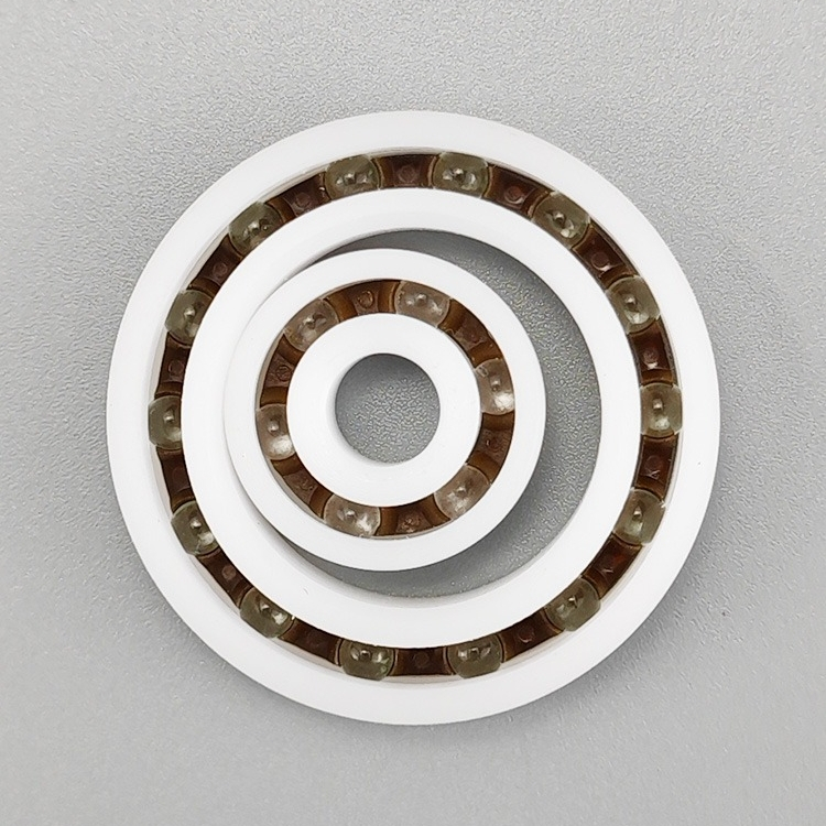 ปอมไนลอนแบริ่งพลาสติก 6000 6001 6002 6003 6004 6005 6006 6007 6200 6201 6202 6203 6204 6205 เรซิ่นวิศวกรรมกันน้ําพลาสติกแบริ่ง - รูปที่ 2