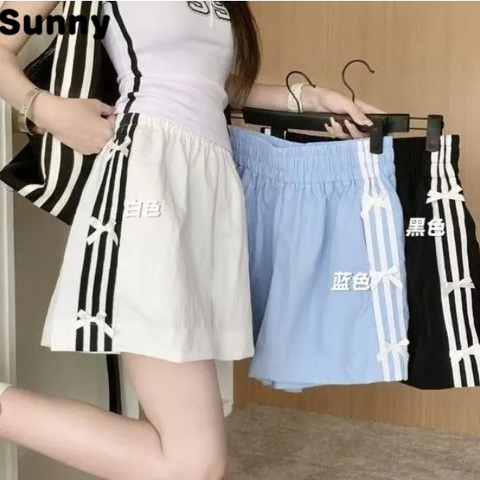 Sunny สีดําลาย Quick-Drying กางเกงขาสั้นผู้หญิงฤดูร้อนบางสไตล์ Bowknot หลวมสบายๆกางเกงกีฬา A-Line Slimmer ดู