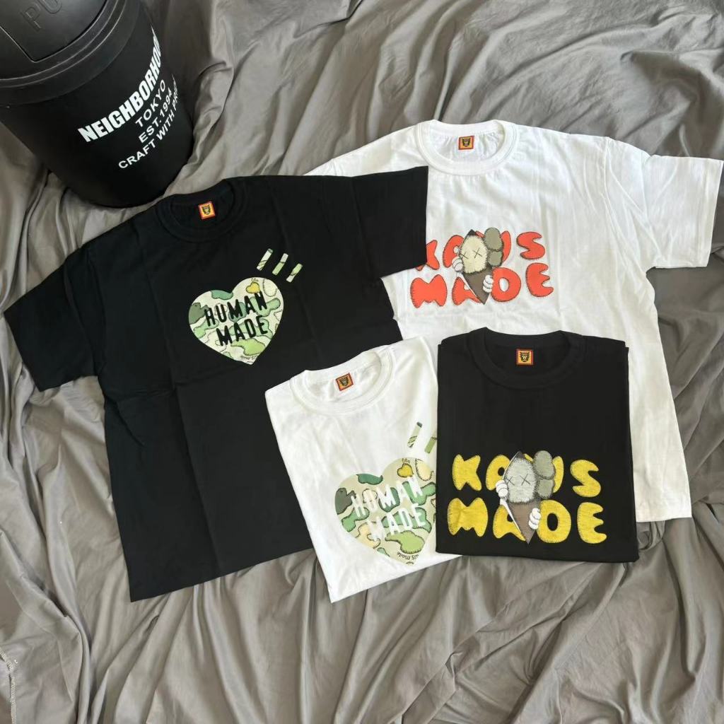Human MADE NIGO KAWS Joint เสื้อยืดแขนสั้น Slub ผ้าฝ้ายไม่มีรอยต่อกระบอกหลวมขนาดใหญ่ผู้ชายผู้หญิงคู่สไตล์