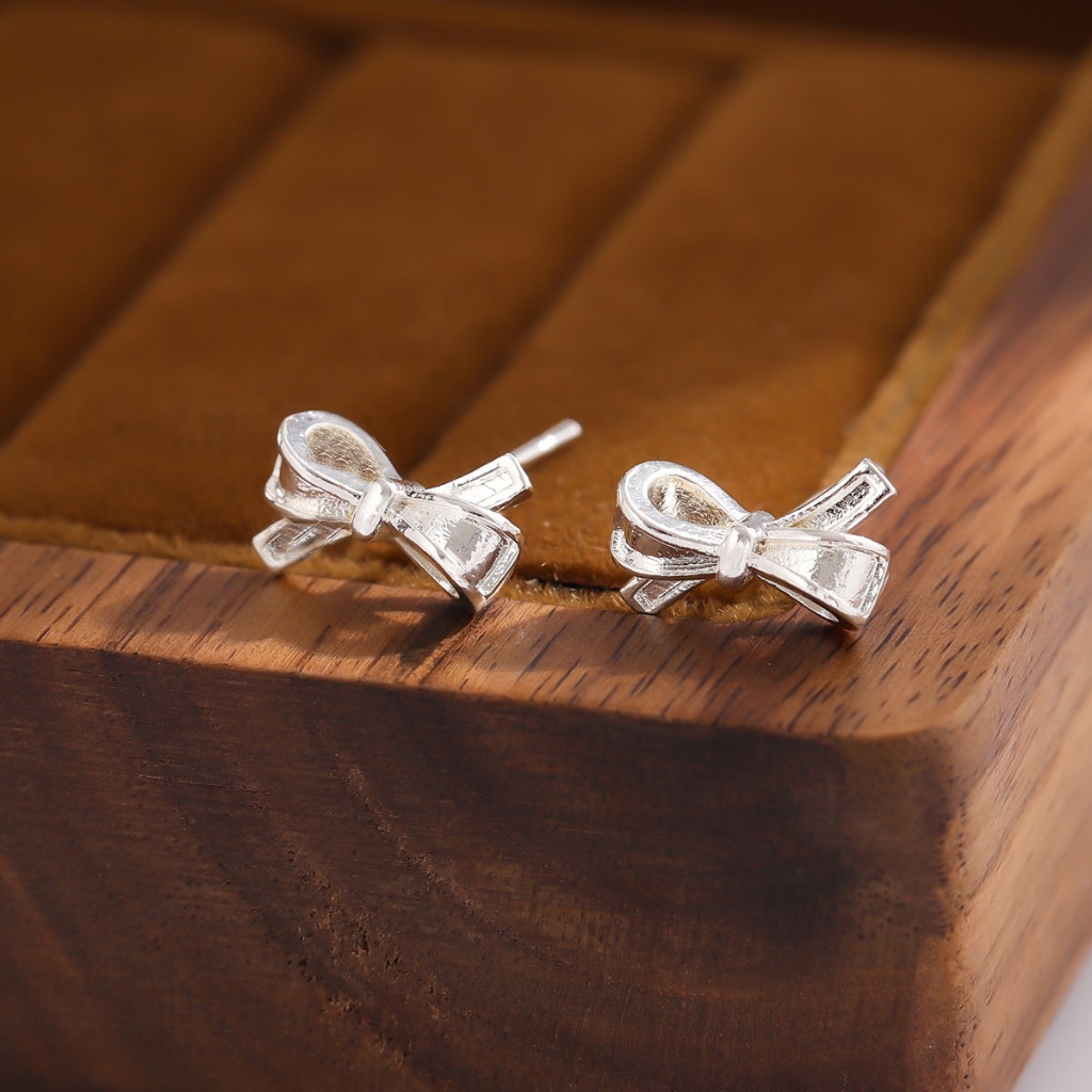 925 เงินสเตอร์ลิงต่างหูแฟชั่นเดิมโบว์ธรรมดาเงินน่ารักสดเฉพาะต่างหูหญิง ซีอี079