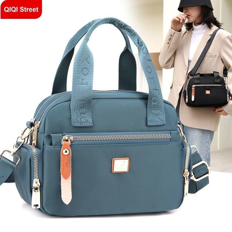 แฟชั่นป้องกันน้ํากระเซ็นกระเป๋าใบเล็กสําหรับผู้หญิง กระเป๋าโทรศัพท์มือถือหลายชั้นเกาหลี กระเป๋าสะพายข้างไหล่ไนลอนน้ําหนักเบา