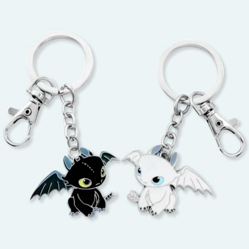 อนิเมะ น่ารัก ชื่อ มังกร ผู้เชี่ยวชาญ พวงกุญแจโทรศัพท์มือถือเสน่ห์จับคู่อุปกรณ์คู่โลหะเชือกเส้นเล็กสีดําของขวัญเพื่อนที่กําหน