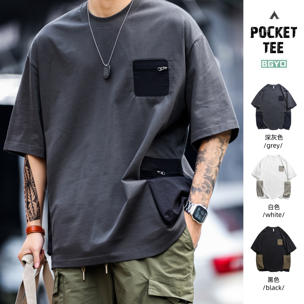 อเมริกันย้อนยุคกลางแจ้งกระเป๋าซิปออกแบบเสื้อยืดแขนสั้นผู้ชายหลวมคมชัดเย็บทํางานสไตล์ ที