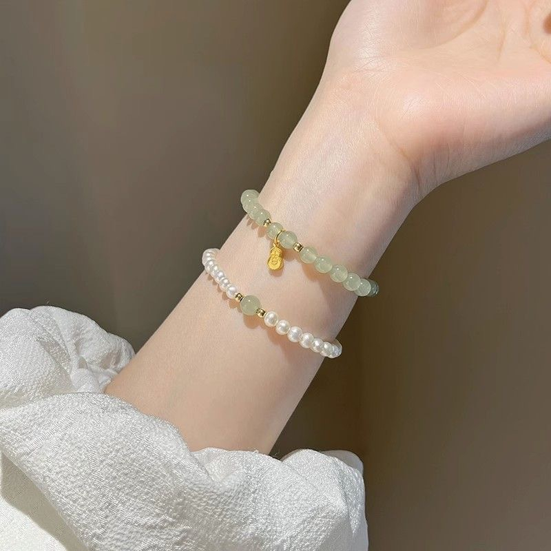 Jushi โชคดีลูกปัดสีเขียว Nerf สร้อยข้อมือมุกของขวัญวันหยุดผู้หญิงเครื่องประดับ