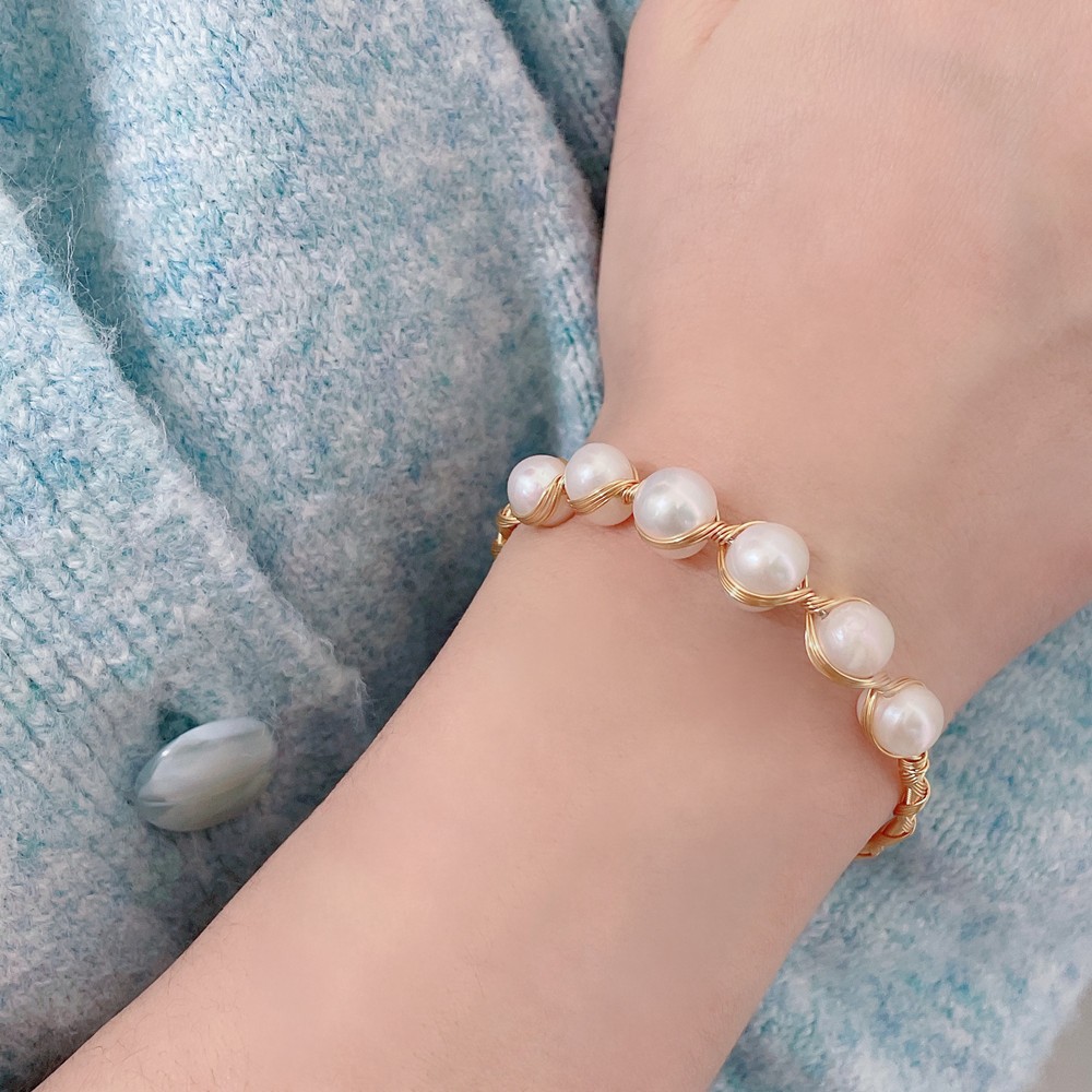 น้ําจืดใกล้รอบมุก 14K สร้อยข้อมือปรับแผลไฟฟ้า