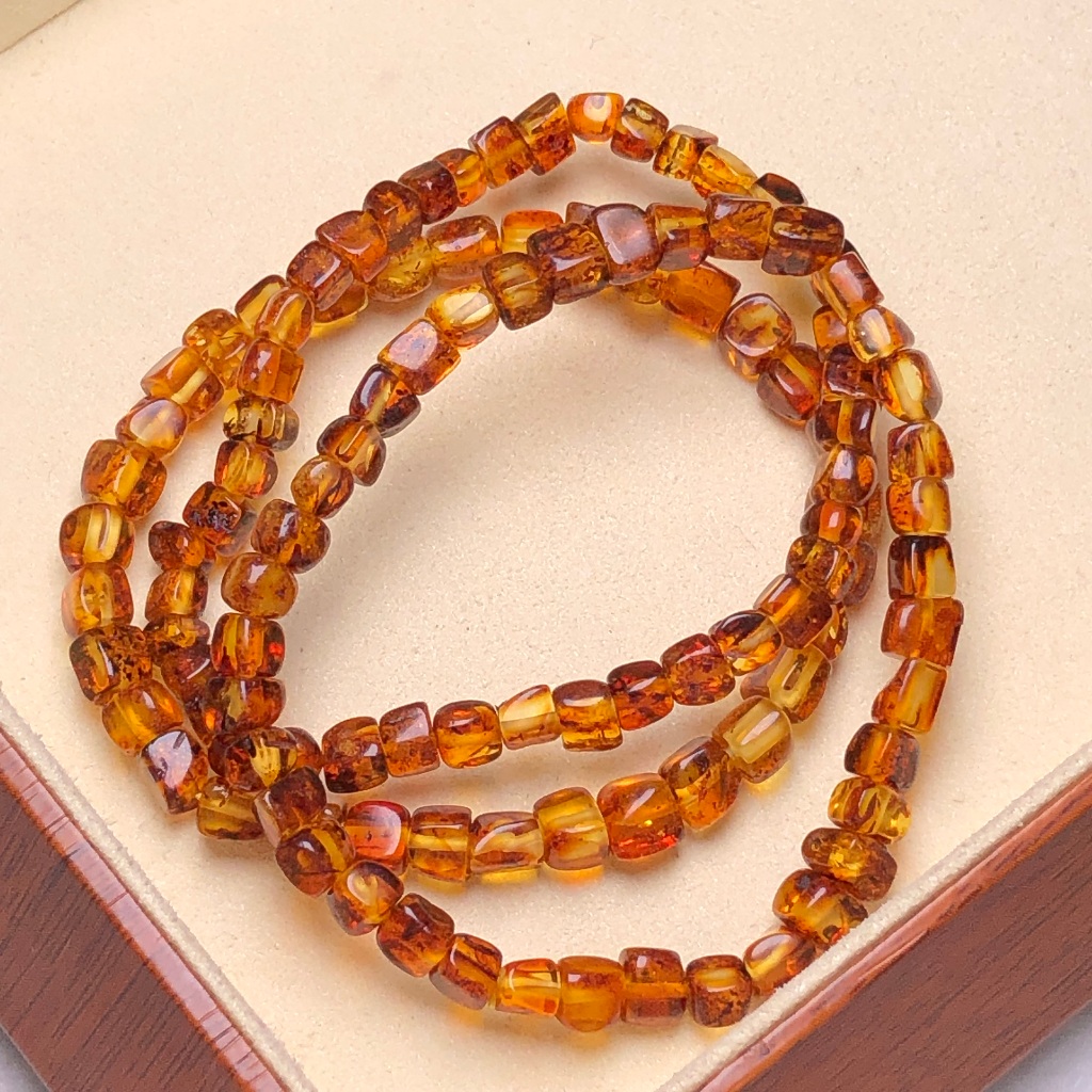 ดอกอําพัน·สร้อยข้อมือลูกบาศก์สีเหลืองอําพันดอกไม้บัลติกธรรมชาติ
