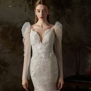 เจ้าสาวแขนบางแขนส่องแสงโปร่งใสของผู้หญิงงานแต่งงานกระโปรงอุป…