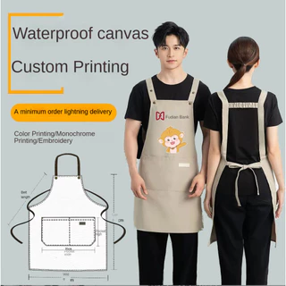 พร้อมสต็อก ผ้าใบผ้ากันเปื้อนกันน้ําโลโก้ที่กําหนดเองพิมพ์จัดเลี้ยงเบเกอร์คาเฟ่สาดหลักฐานทํางานผ้าเปื้อนหญิงบ้านครัวผ้ากันเปื้อนทําอาหารชาย