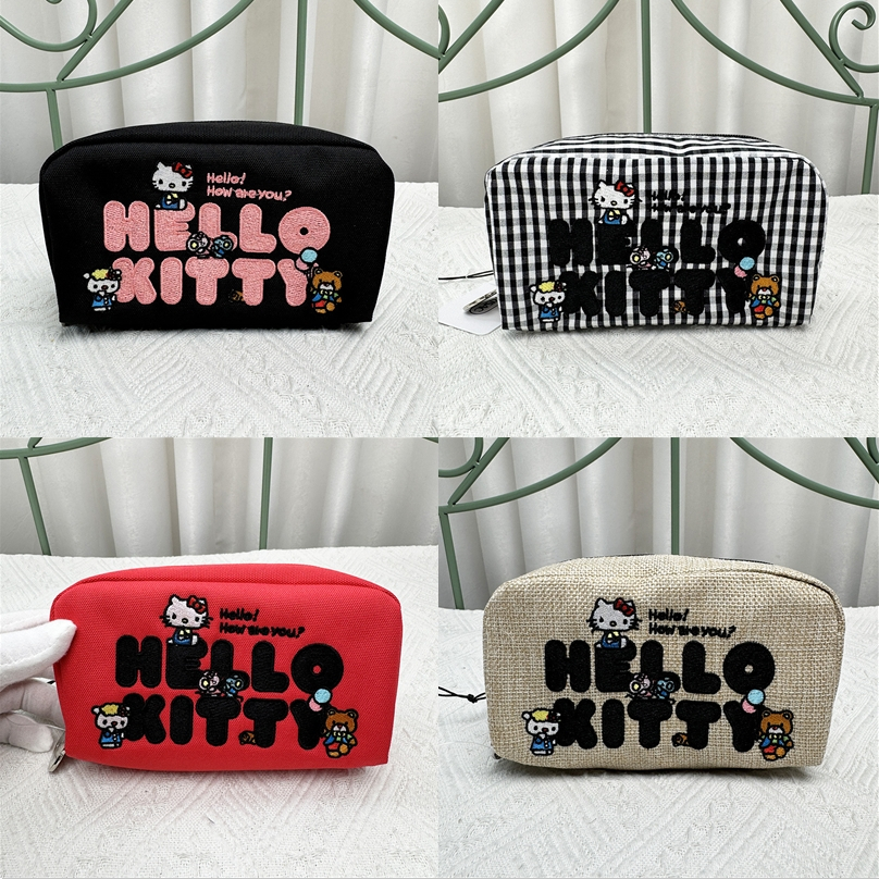 LeSportsac  เลสปอร์ตแซค สไตล์ใหม่ คิตตี้ การ์ตูนปักกระเป๋าหญิง/กระเป๋าเก็บแต่งหน้ากระเป๋าคลัทช์ 7121