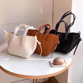 Leacat หนังนุ่ม niche wing bag tote bag premium sense กระเป๋าถือความจุขนาดใหญ่ combuting womens bag