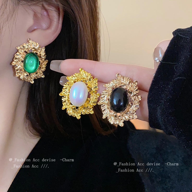 เข็มเงินรูปไข่ใบต่างหูกลางยุโรปและสหรัฐอเมริกาการออกแบบที่โอ้อวดความรู้สึกต่างหูย้อนยุคซอกทุกการแข่งขันต่างหูขายส่งหญิง