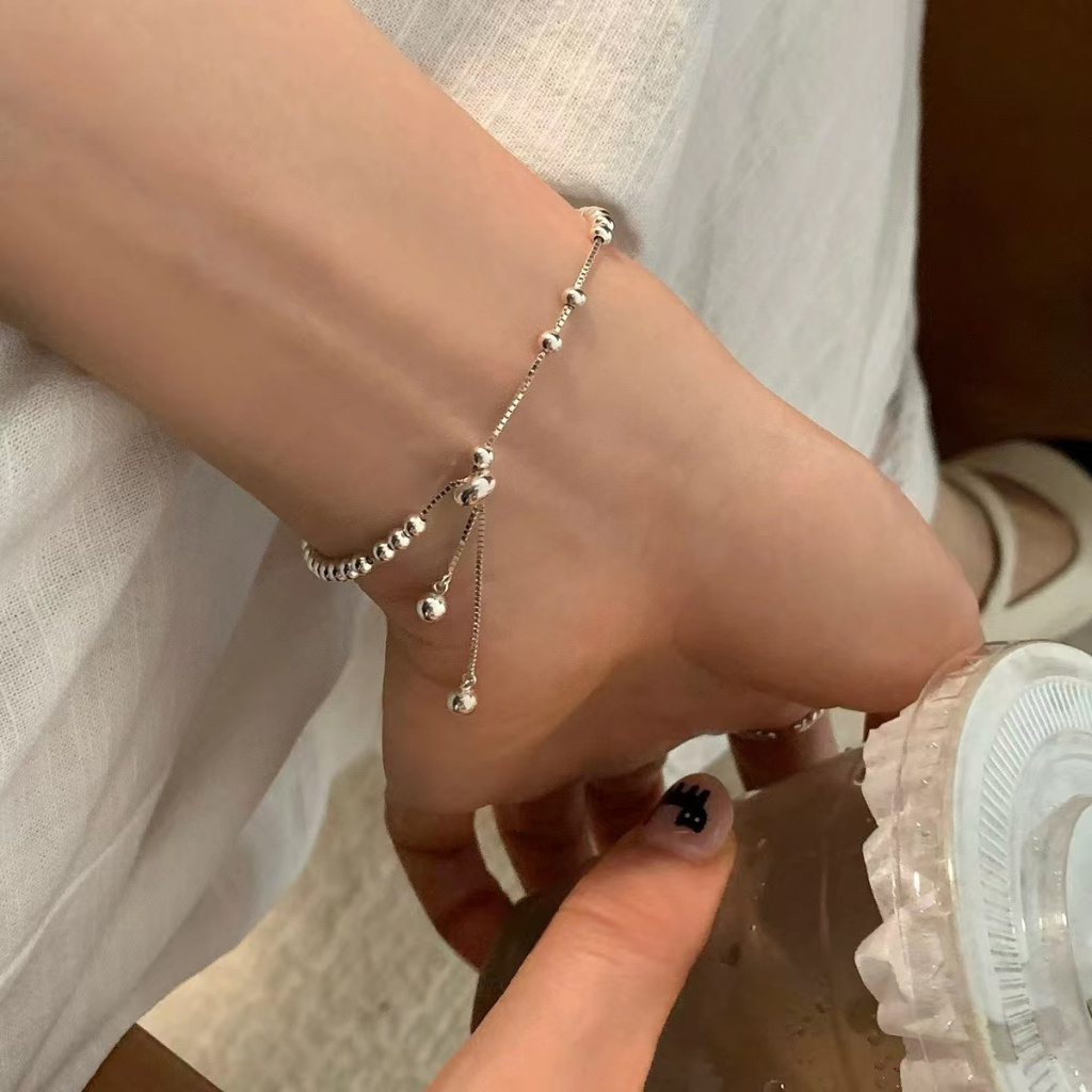 ส925เงินแปรงโอนรอบสร้อยข้อมือลูกปัดหญิงแสงหรูหราซอกประณีตดึงออกปรับสร้อยข้อมือสไตล์ใหม่