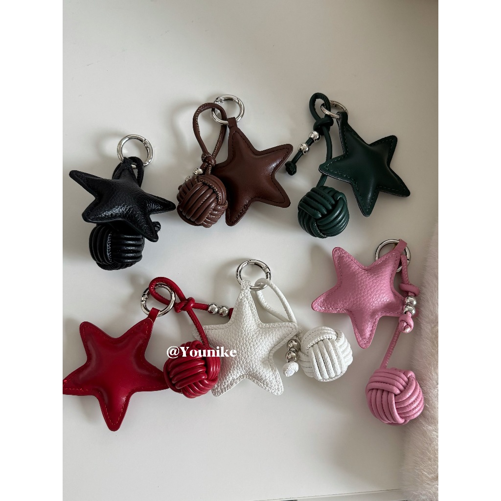 South Korea นําเข้าหนังแฟชั่น All-Match Retro High-End Leather Star Bag Pendant miu Series พวงกุญแจรถ