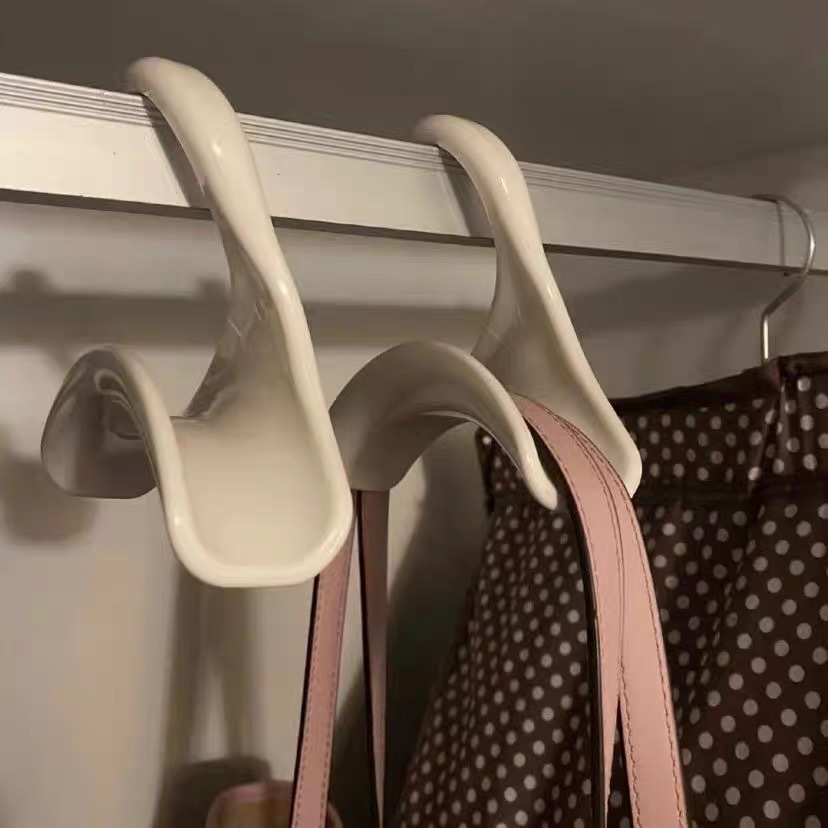 จะไม่ปล่อยให้กระเป๋า Deformed Hooks Arch กระเป๋าเก็บไม้แขวนเสื้อปากกว้างตู้เสื้อผ้าที่ใช้งานได้จริงแขวนสไตล์เกาหลี