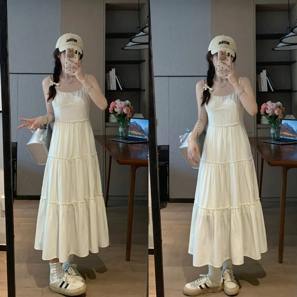Bella Shop กระโปรงยาวเอวเรียบหรูสำหรับวันหยุดพักผ่อนริมทะเลแบบใหม่ชุดเดรสสายเดี่ยวสีเบจสำหรับออกเดทเซ็กซี่อ่อนโยน