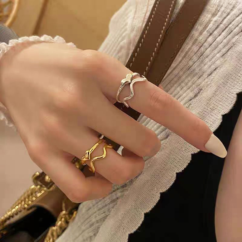 แหวนคลื่นสายหัวใจรักเงาหนึ่งขนาดวัสดุสแตนเลสกันน้ํากันเหงื่อจะไม่จางหายความรู้สึกการออกแบบฮิปฮอปเฉพาะเหมาะสําหรับสุภาพสตร