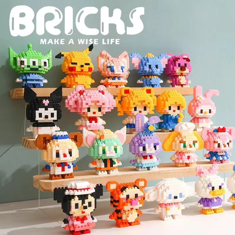 พร้อมที่จะส่ง 60 ตัวอักษรการ ์ ตูน Disney Sanrio Nintendo Pokemon Block ของเล ่ นการ ์ ตูนหมีสตรอเบอร ์ รี ่ หมีของเล ่ นเพื ่ อการศึกษาสําหรับเด ็ ก
