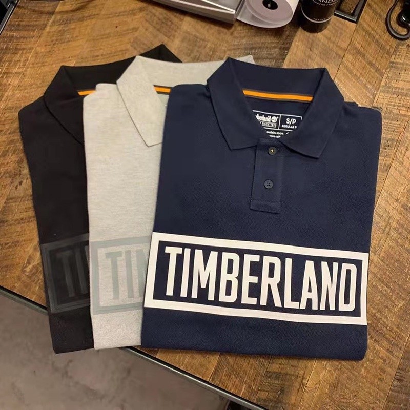 Timberlan Men เสื้อโปโลแขนสั้นลําลอง เสื้อยืดปก ตัวอักษร Vitality ยอดนิยม