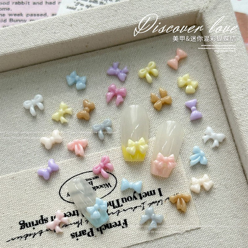 100ชิ้นเล็บมินิผสมหลากหลายโบว์ที่มีสีสัน ของผู้หญิง เรซิ่นเล็บศิลปะ ทําเอง เสน่ห์ตกแต่ง
