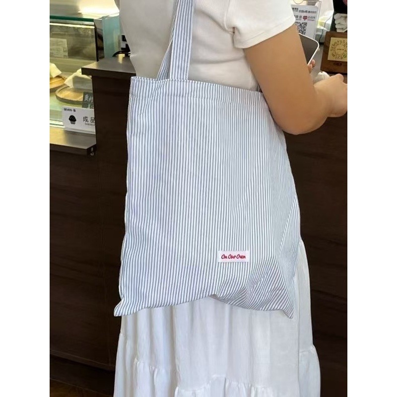 【จัดส่งจากประเทศไทย】🌼พร้อมส่ง🌼ใหม่เกาหลีขนาดใหญ่-ความจุลายผ้าใบกระเป๋าหญิงย้อนยุคพร็อพไหล่ผ้าใบกระเป๋าขี้เกียจกระเป๋าถือพร็อพ
