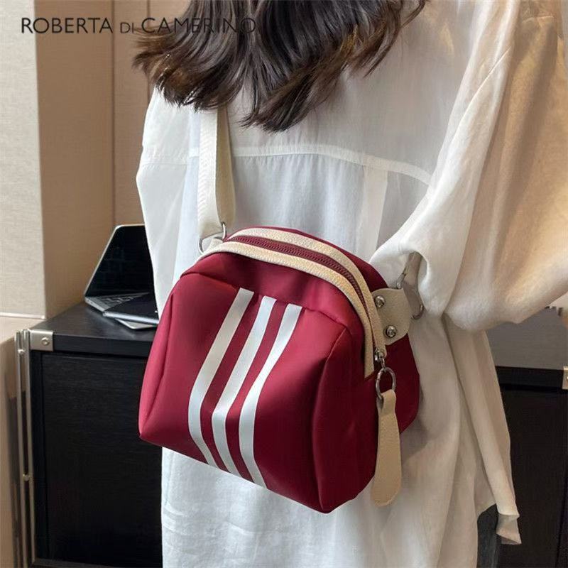 【จัดส่งจากประเทศไทย】 พร้อมส่ง กระเป๋าผ้าไนลอนลําลองผู้หญิง 2024 สไตล์ใหม่ Niche Shell กระเป๋าน้ําหนักเบา All-Match กระเป๋า Messenger ขนาดใหญ่