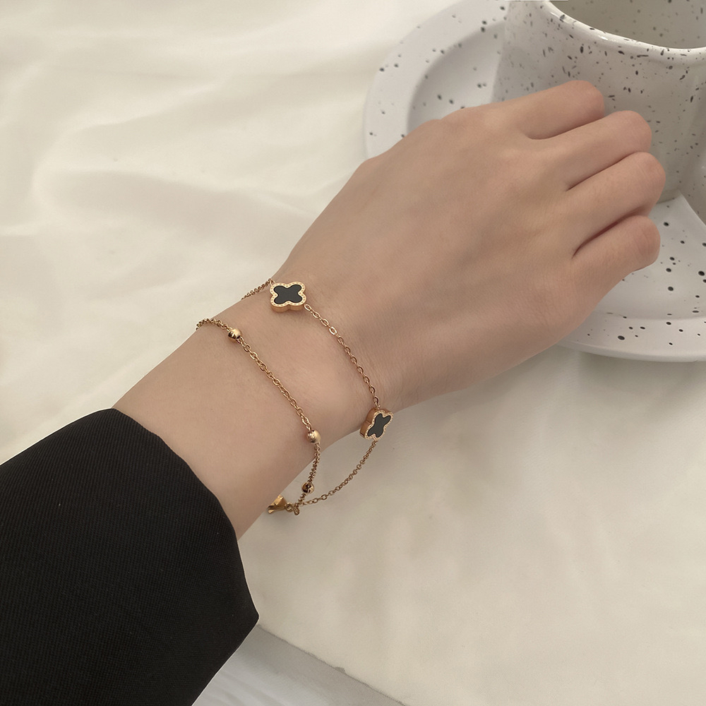 ญี่ปุ่นสไตล์เกาหลีสองชั้นสีดําสีขาวเชลล์สองด้านโคลเวอร์สี่ใบไทเทเนียม - รูปที่ 7