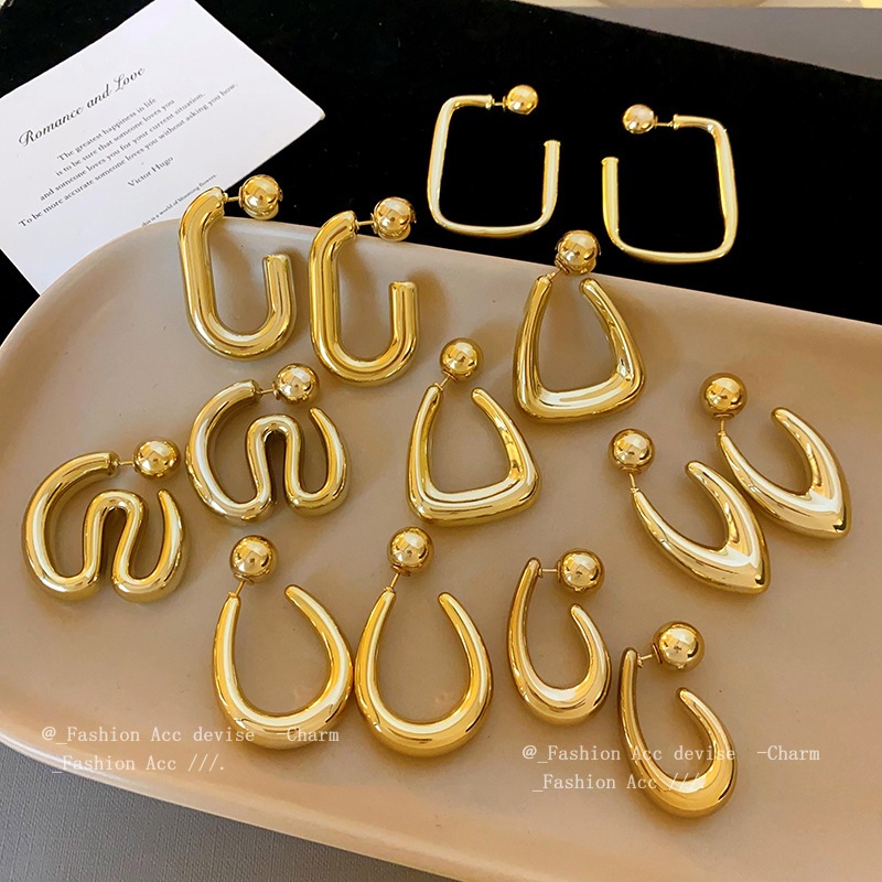 เข็มเงินกสองสวมใส่รอบบอลจดหมายต่างหูยุโรปและสหรัฐอเมริกาโลหะลมต่างหูแฟชั่นทั้งหมดอาวุโสความรู้สึกของผู้หญิง