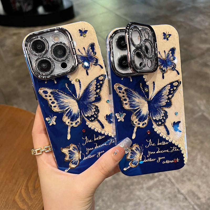 เหมาะสําหรับเคส iPhone เคสซีรีส์ iPhone 16promax เคส 15promax 14promax 12promax 14plus 16 15 14 13 12 11 ผีเสื้อสีฟ้าแฟชั่น TPU พร้อมเคสฟิล์มเลนส์พลิก