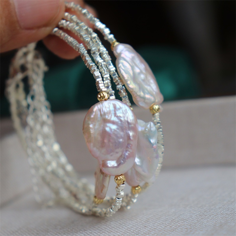 เงินหักเงินสร้อยข้อมือมุกพิสดารน้ําจืดธรรมชาติ