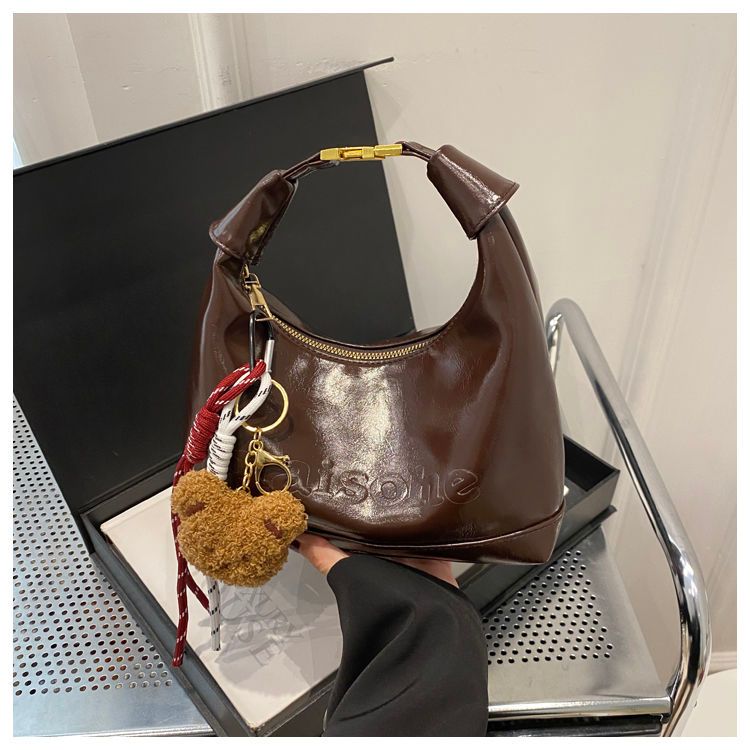 High-end Feeling Melade Hand Bag ผู้หญิงฤดูใบไม้ร่วงสไตล์ใหม่ยอดนิยมแฟชั่น All-Match One-Shoulder Messenger กระเป๋า