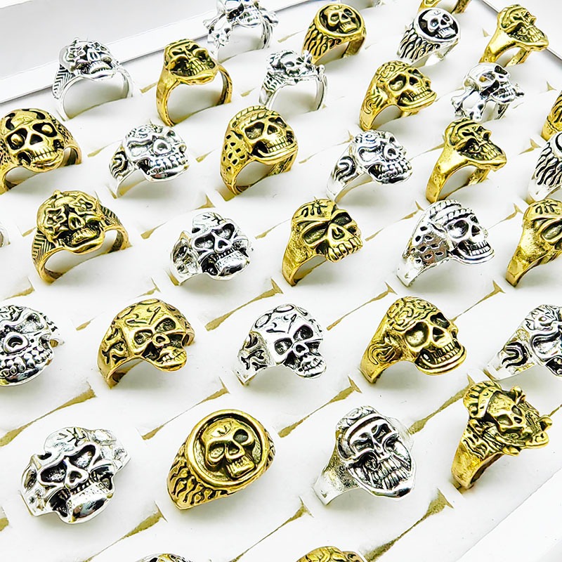 10 ชิ้น/ล็อตเครื่องประดับโรงงานผสมขนาดใหม่ Hollow Skull แหวนนิ้วมือสําหรับผู้หญิงผู้ชาย Hot Gothic Cutout Skeleton Party Bar ของขวัญ