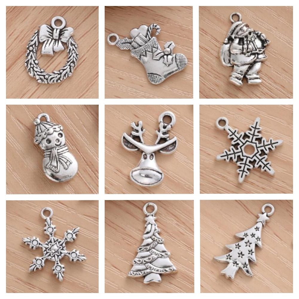 ทําเครื่องประดับเสน่ห์คริสต์มาสจี้โลหะผสมสังกะสีเงินโบราณงานฝีมือ ทําเอง และอุปกรณ์งานฝีมือคอลเลกชันงานรื่นเริงรวมถึงต้นไม้เกล็ดหิมะมนุษย์หิมะและอ